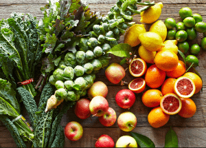 a group of fruits and vegetables on a wood surface Healthy Weight Loss Diets Moss Side
